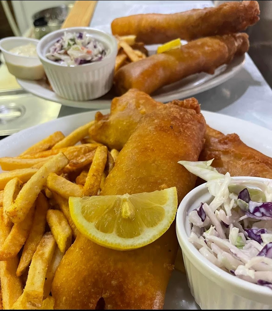 Hand-battered fish & chips with fries and coleslaw