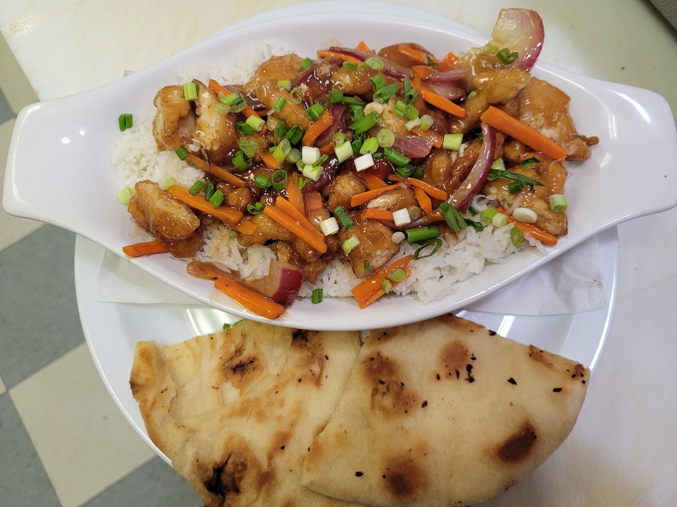 Teriyaki chicken on basmati rice with naan bread