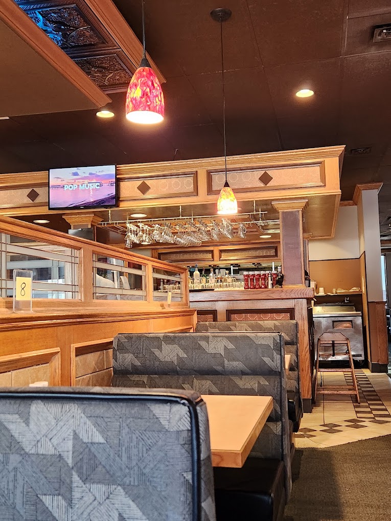 Warm wooden booths and pendant lighting inside the Hungry Bear Diner Agassiz